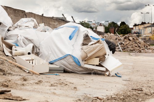 Waste collection crew briefing at a commercial site